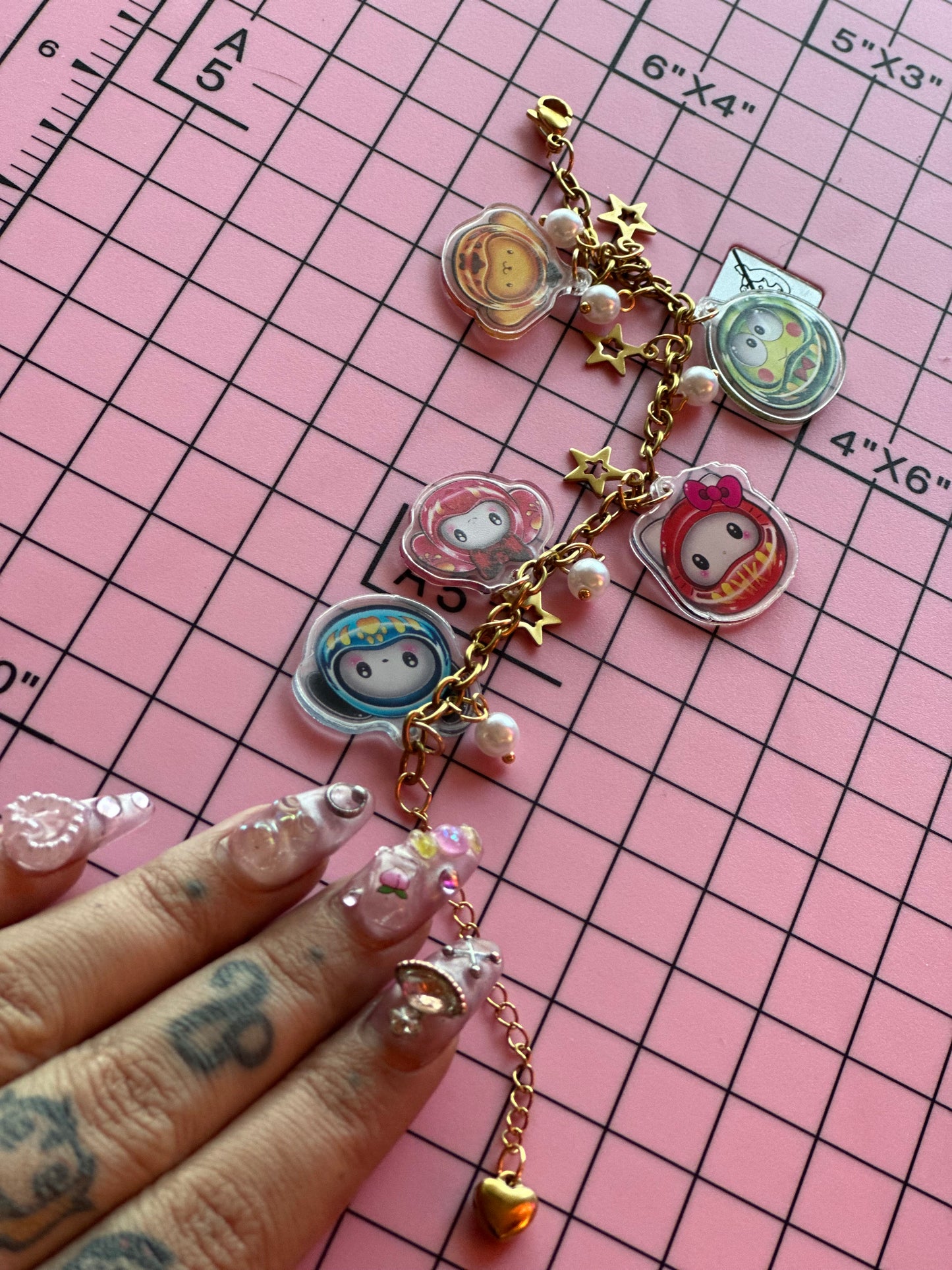 Hell0 kitty Duruma doll charm bracelet